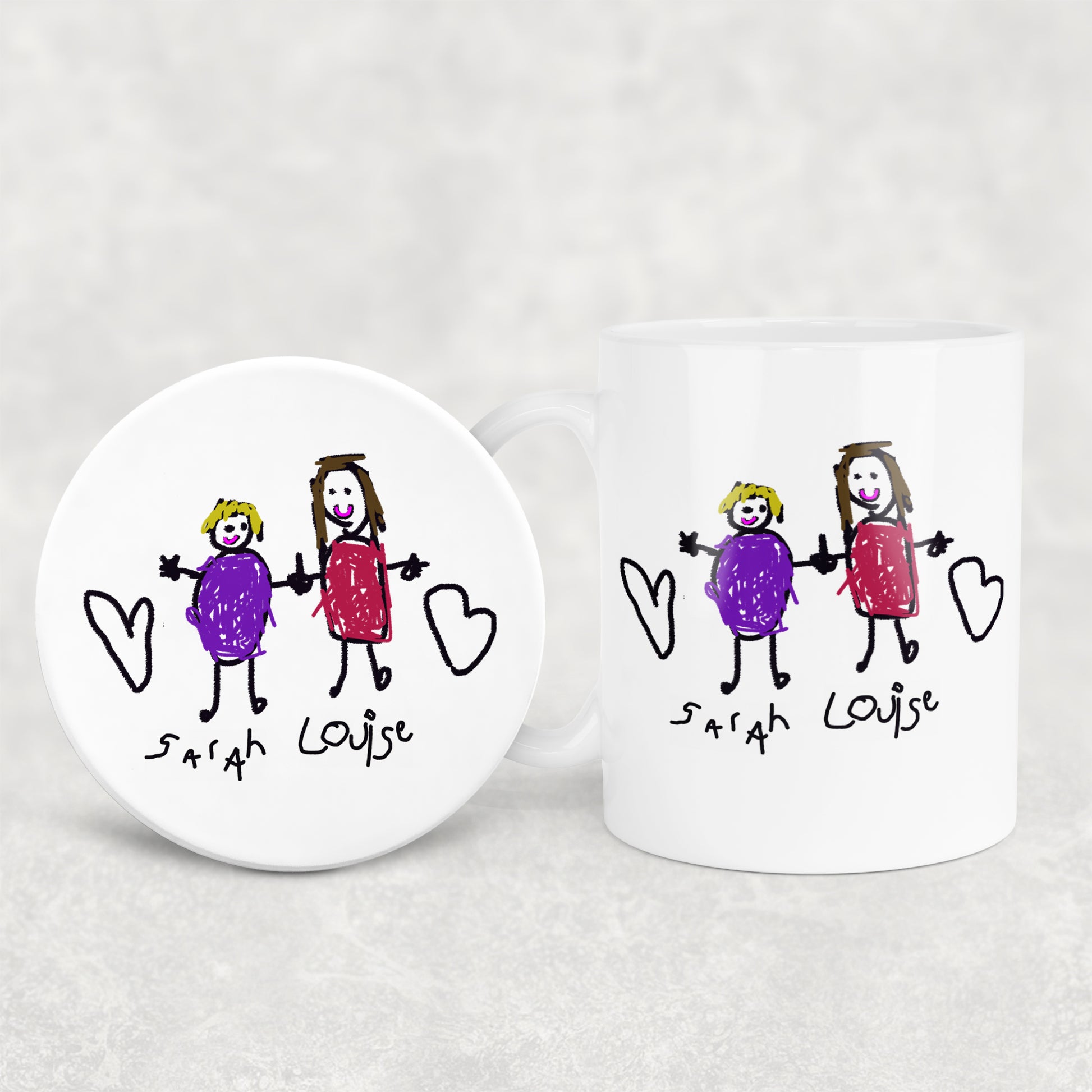 Two white mugs with hand-drawn illustrations of two girls holding hands and hearts, labeled 'Sarah Louise'.| Little Heirloom