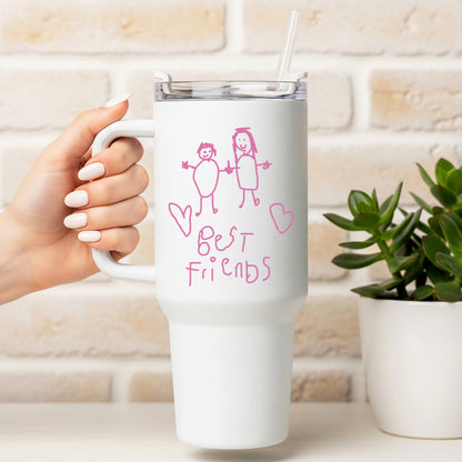 White mug with 'Best Friends' design held by a hand, against a light brick wall background. | Little Heirloom