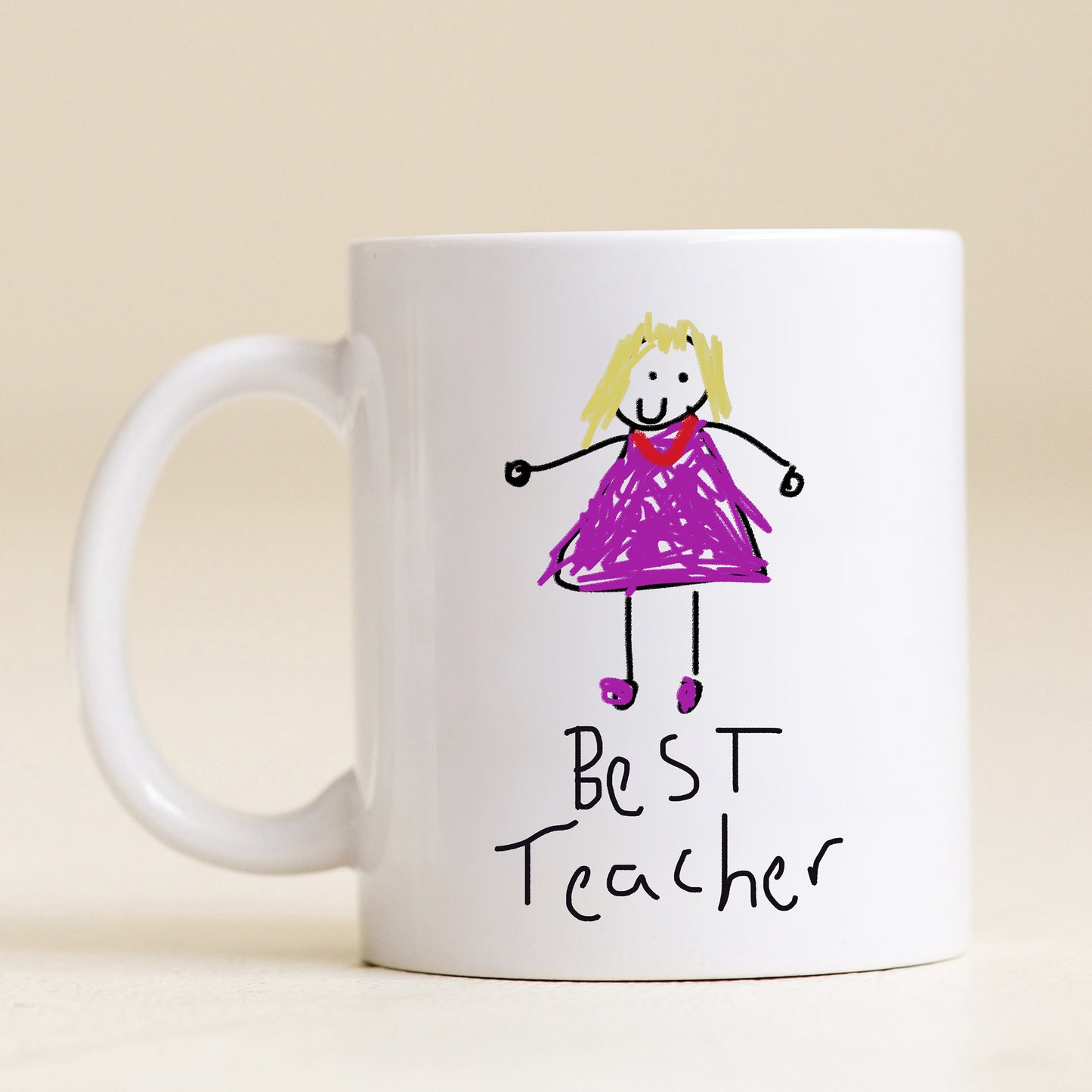 White mug with a child-like drawing of a girl in a purple dress and 'Best Teacher' text on a beige background | Little Heirloom