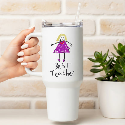 White travel mug with a drawing of a girl in a purple dress and 'Best Teacher' text, held by a hand. | Little Heirloom
