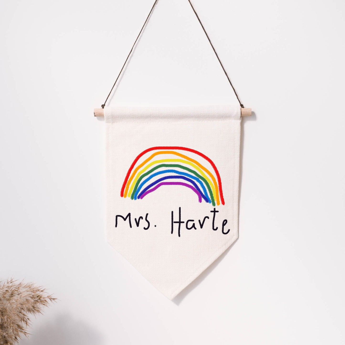 Canvas wall hanging with a rainbow and text 'Mrs. Harte' on a white background | Little Heirloom