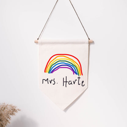 Canvas wall hanging with a rainbow and text 'Mrs. Harte' on a white background | Little Heirloom