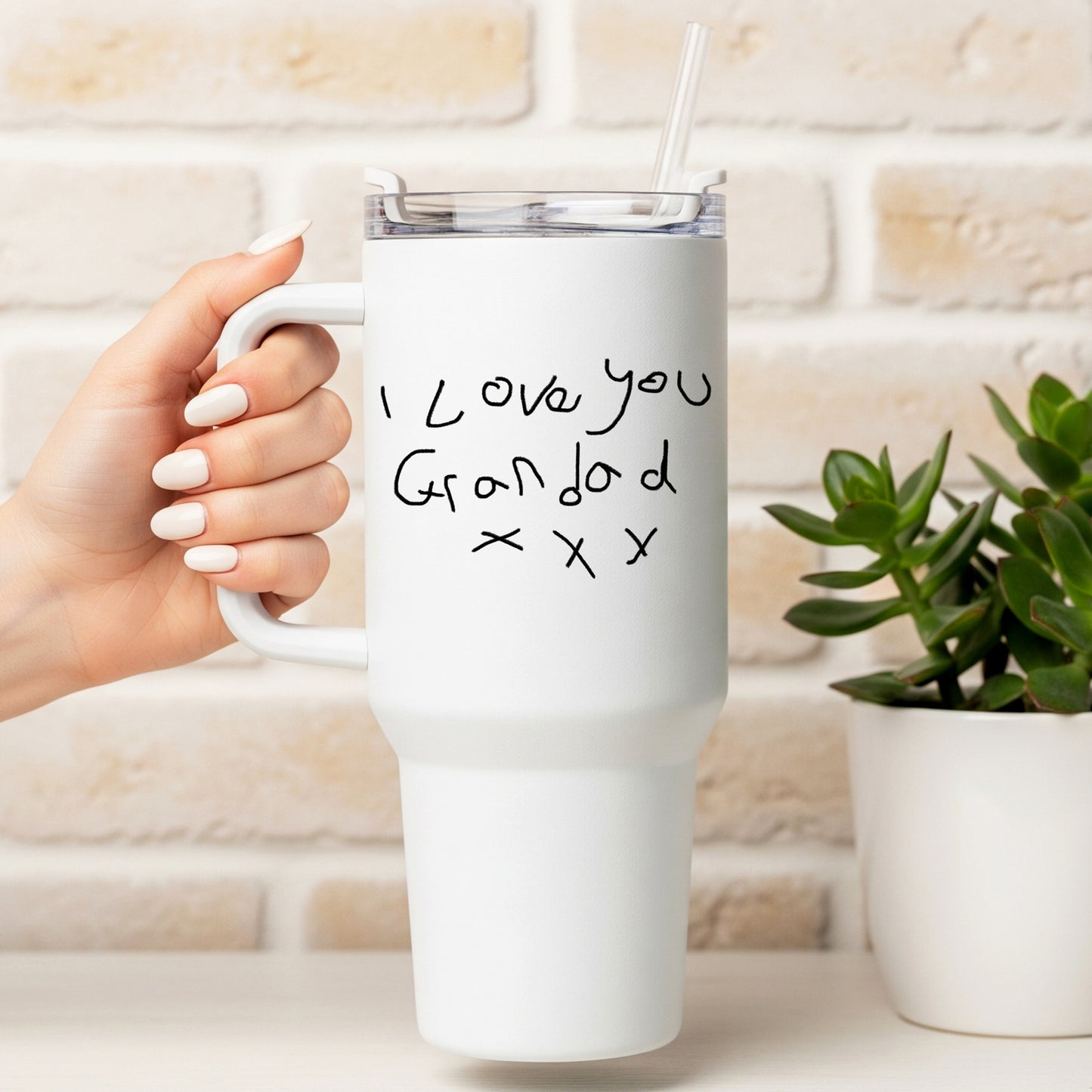 White mug with 'I Love you Grandad xoxo' text held by a hand, against a light brick wall. | Little Heirloom