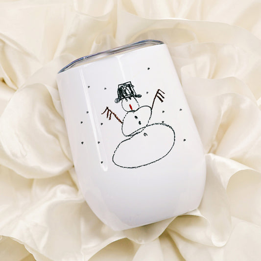 White tumbler with a snowman design on a soft beige background | Little Heirloom